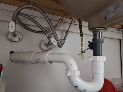 pipe under sink leaking at connection|Leak Under Kitchen Sink: What To Do